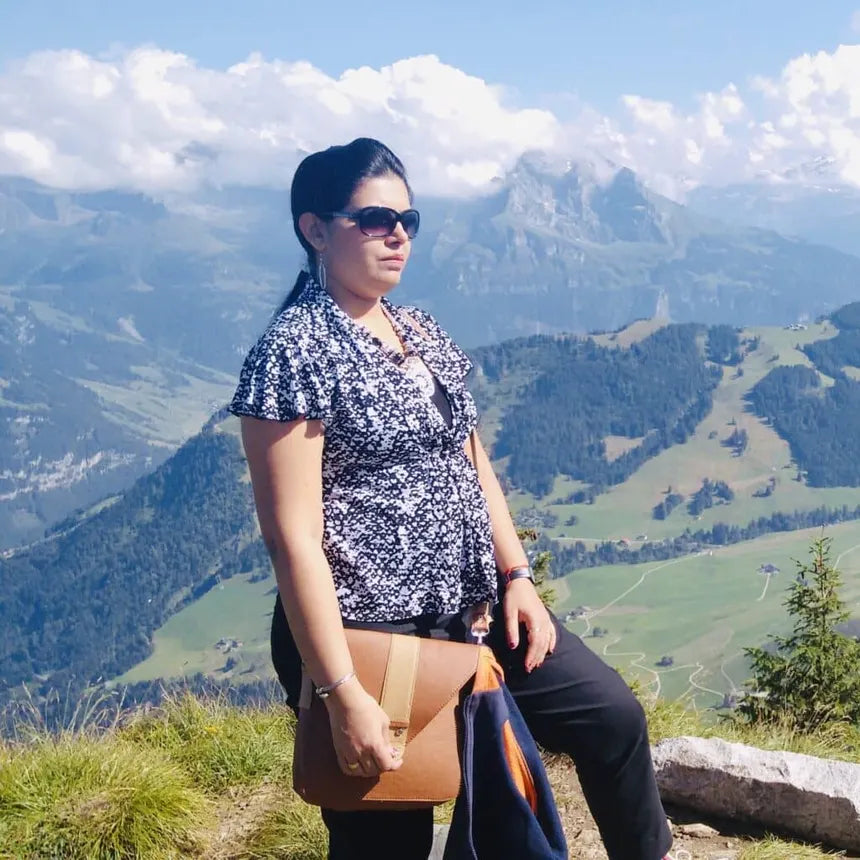files/Shruti-Mishra-on-a-scenic-outlook-mountain-1024x1024.webp